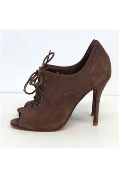 Size 6B Deep Taupe Peep Toe Heels Leather sole Some wear on outsole Leather upper Lace up front Lightly padded insole Heel height 4.25" Brown Ankle-high Heels With Padded Heel, Closed Toe Heels With Padded Ankle And Medium Width, Medium Width Closed Toe Heels With Padded Ankle, Brown Leather Heels With Padded Ankle, Lace-up Heels With 4-inch Heel Medium Width, Lace-up Heels With 4-inch Heel And Medium Width, Suede Lace-up Heels With 4-inch Heel, Lace-up Suede Heels With 4-inch Heel, Formal Closed Toe Heels With Padded Ankle