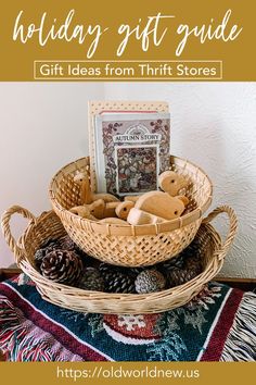 a basket filled with stuffed animals on top of a rug next to a christmas tree