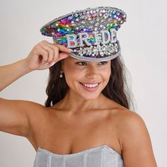 Make the bride feel incredible on her hen party with this stunning bride hat! This embellished hat is a must-have for any bride to make her feel extra special plus, it's the perfect instagrammable bridal hat! Each pack contains: 1 x Multi-coloured embellished bride hat Bridal Era, Bachelorette Hats, Halloween Photo Booth, Daisy Headband, Christmas Dress Up, Pearl Bride, Rainbow Hats, Garland Backdrops, Ginger Ray