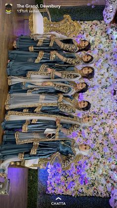 the bridesmaids are posing in their dresses