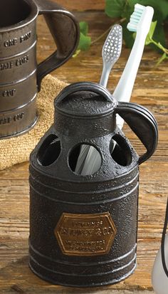 the toothbrush holder is made out of an old oil can