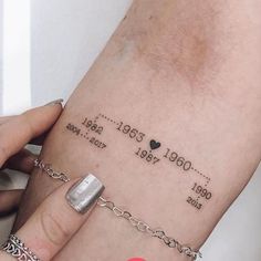 a woman's arm with a tattoo on it that reads, date and time