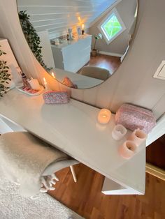 there is a vanity with candles on it