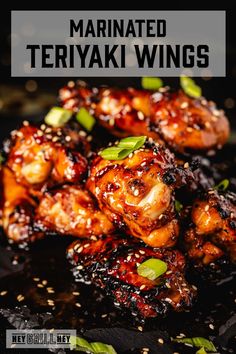 marinated teriyaki wings with sesame seeds on top and text overlay that reads marinated teriyaki wings