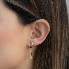 Super cute & stylish drop earrings! They are great because they make a statement but are still minimalist and chic at the same time! Can be dressed up or down! :) - - - D E T A I L S - - -  * Made of 925 Sterling Silver * THICK plating of 14k Gold or Rhodium  * Inner Diameter: 8mm * Drop Length: 20mm * Sold as a pair * Nickel-free & Hypoallergenic  Made with 100% Pure Love! ♡ Happy to answer any questions you may have! 🥰 Let's Connect! 🥰 IG: samijewels_ Elegant Teardrop Cartilage Earrings, Modern Drop Diamond Earrings For Everyday Wear, Modern Everyday Drop Diamond Earrings, Everyday Diamond Teardrop Earrings, Dainty Teardrop Earrings For Everyday, Teardrop Single Cartilage Earring For Wedding, Minimalist Teardrop Plug Earrings As Gift, Modern Drop Diamond Earrings As A Gift, Minimalist Teardrop Cartilage Earrings With Ear Wire