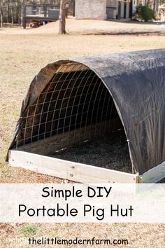 a simple diy portable pig hut in the yard with text overlay that reads, simple diy portable pig hut