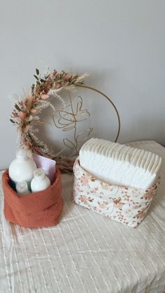 a close up of a hair brush on a table near a container with soap and lotion