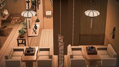 an overhead view of a living room and dining area in a house with wood paneling