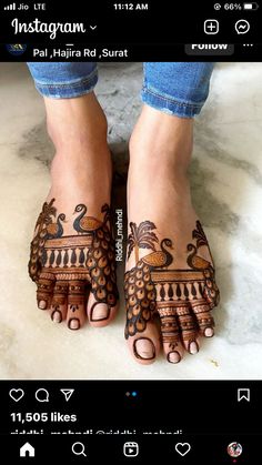 the feet are decorated with henna