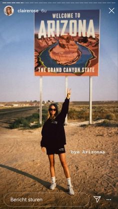 a woman standing in front of a welcome to arizona sign with her hand up and the words'welcome to arizona, the grand canyon state '