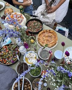 a table filled with lots of food on top of it