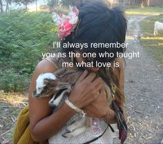 a woman holding a small dog in her arms with the words i'll always remember you as the one who taught me what love is