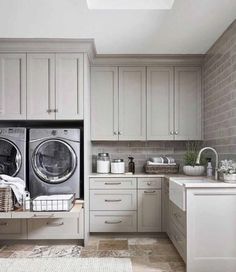 a washer and dryer sitting in a kitchen