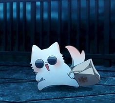 a white cat wearing sunglasses and holding an envelope