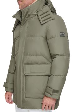 Stay cozy all winter in this parka that features a drawcord hood and a removable bib made with lustrous, lightweight down & feather fill. 33 1/2" length Stand collar; removable drawcord hood Adjustable hook-and-loop cuffs Water-resistant Lined, with down and feather fill 100% polyester Dry clean Imported Hooded Down Parka With Padded Collar, Cold Weather Down Parka With Drawstring Hood, Hooded Down Parka With Drawstring Hood, Down Parka With Pockets For Outdoor, Outdoor Down Parka With Pockets, Down Parka With Double-lined Hood, Casual Down Parka With Detachable Hood, Outdoor Puffer Parka With Down Filling, Outdoor Down Puffer Parka