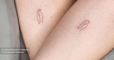 two small tattoos on the legs of someone's legs, one with an oval shape