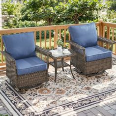 two chairs and a table on a patio