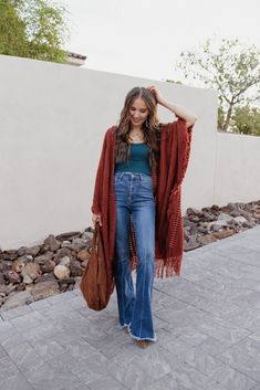 Women's Oversized Frayed Cardigan Open Bohemian Ruana Wrap yourself in playful bohemian vibes with our Open Bohemian Ruana. The oversized fit and frayed fringe detail add a touch of quirkiness to any outfit. Plus, it's one size fits all for easy and cute styling. Perfect for those who don't take fashion too seriously. (Wink!) Please note the next CUSTOM CUT WILL RESTOCK AND SHIP AROUND 12/6 FOR THE RUST. ALL OTHER COLORS IN STOCK READY TO SHIP! Details Available in size: One size Available in co