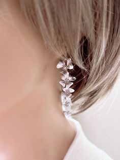 Elegant Silver Flower Earrings For Mother's Day, Delicate Silver Jewelry With Flower Decoration, Feminine Flower Necklaces For Wedding, Silver Jewelry With Flower Decoration For Party, Silver Jewelry With Flower Charm For Party, Silver Flower Charm Jewelry For Party, Silver Party Jewelry With Flower Charm, Feminine Flower Decorated Jewelry, Silver Party Jewelry With Flower Decoration