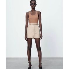 Nwt Zara High Waisted Shorts Tan Shorts With Pleated Front, Side Pockets, Faux Back Pockets, Belt. Please Note: Belt Is Not In Such Great Condition. You Can Wear Your Own Belt. Color: Cream Size M New With Tags B89 Brown Shorts For Summer Workwear, Brown Summer Workwear Shorts, Chic Brown Short Bottoms, Chic Brown Short Length Bottoms, Chic Short Length Brown Bottoms, Beige Shorts For Night Out, Chic Beige Bermuda Shorts, Chic Beige Shorts, Chic High Waist Brown Shorts