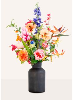 a black vase filled with lots of colorful flowers