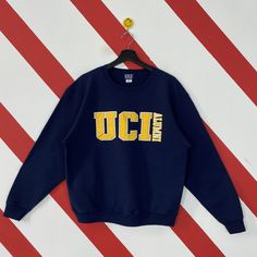 Vintage University California Irvine Sweatshirt Irvine Crewneck Irvine Sweater University Irvine Anteaters Patch Embroidered Logo Blue Small Brand Name :- University California Irvine  📌 Tag Size :- Small Manual Measurement :- WIDTH (armpit to armpit) :- 22.5 inches / 57cm LENGTH (shoulder to end of garment) :- 25.5 inches / 65cm Condition :- Good Condition 8/10. No Hole, No Stain. 📮DHL EXPRESS = 3-6 business day arrived 🔥SALE SALE SALE🔥 🔥SALE SALE SALE🔥 🛒 PURCHASE 4 ITEM FREE SHIPPING 🛒 PURCHASE 4 ITEM FREE SHIPPING 🛒 PURCHASE 4 ITEM FREE SHIPPING Navy Top With Embroidered Logo For College, Blue Embroidered College T-shirt, Collegiate Long Sleeve T-shirt With Letter Embroidery, Blue Crew Neck Sweatshirt With Embroidered Logo, Blue Collegiate Sweatshirt For Campus, Crew Neck Top With Embroidered Logo For College, Blue Crew Neck Top For Campus, Blue Long Sleeve T-shirt With Embroidered Text, Cotton Campus Top With Letter Embroidery