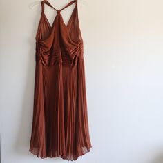 Absolutely Stunning Anne Klein Silk Pleated Sleeveless Dress In Exotic Nights Terracotta Brown Color. Size Us 14/Uk 18/It 48. Back Zipper Closure, 100% Silk. Two Layers Of Lining. Length - 47" Waist - 34" Bust - 39" Pleated Halter Neck Sleeveless Dress For Date Night, Sleeveless Pleated Halter Dress For Date Night, Pleated Sleeveless Halter Dress For Date Night, Brown Sleeveless Pleated Dress, Summer Sleeveless V-neck Dress In Brown, Hippie Sleeveless Brown Dress, Summer Sleeveless V-neck Brown Dress, Brown V-neck Evening Mini Dress, Hippie Brown V-neck Dress