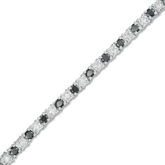 Brighten up your favorite day or evening looks with the classic elegance of this black and white diamond alternating tennis bracelet. Crafted in sterling silver Alluring 1/15 ct. black diamonds alternate with dainty white diamonds - artfully set to enhance size and sparkle. Captivating with 2-3/4 cts. t.w. of diamonds This 7.0-inch bracelet secures with a tongue and groove clasp. Classic Round Black Diamond Bracelet, Formal Tennis Bracelet With Black Diamonds, Black Diamond Round Bracelet, Classic Black Diamond Tennis Bracelet, Classic Tennis Bracelet With Black Diamonds For Formal Occasions, Classic White Gold Diamond Bracelet With Black Diamonds, Formal Diamond Bracelet With Black Diamonds, Classic White Gold Bracelets With Black Diamonds, Formal White Gold Diamond Bracelet With Black Diamonds