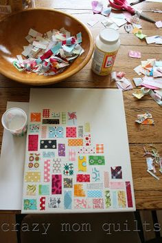 the crafting supplies are on the table ready to be put into the paper bag