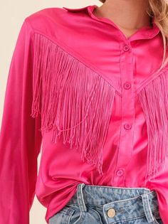 Make an entrance with our Spirited Chevron Satin Fringe Blouse! This blouse brings the perfect mix of sophistication and sass to your wardrobe - with its polished collar neckline and long sleeves for an effortless chic look, plus eye-catching fringe embellishment to really make your outfit pop. Color: White, Hot Pink, Black Fabric: 100% Polyester Brand: Blue B Includes: x1 Blouse Sizes: S-M-L, Regular Sizing Length: 27 -28” Model is 5' 7" and wearing a size small. Cowgirl Clothes, Fringe Blouse, Satin Button Up, Fringe Shirt, Embellished Blouse, Satin Shirt, Sheer Fabric, Effortless Chic, Western Shirts