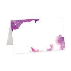 a purple and white card with watercolor paint splattered on it's side