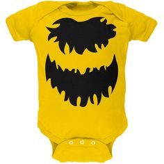 a yellow bodysuit with black teeth and fangs on it