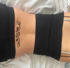 a woman's arm with writing on it