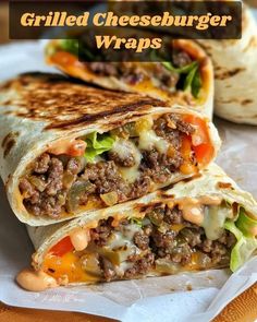 grilled cheeseburger wraps on a plate with text overlay that reads grilled cheeseburger wraps