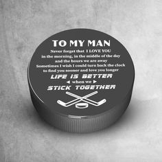 a hockey puck with the poem to my man