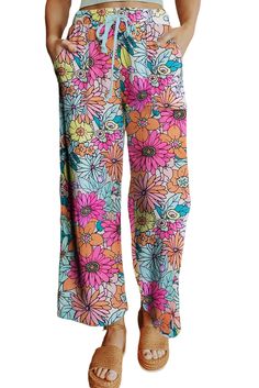 Multicolor Flower Print Pocketed Drawstring Waist Wide Leg Pants Floral Print Pants For Beach Day Out, Floral Print Summer Pants For Beach Season, Summer Floral Print Pants For Beach Season, Bohemian Pants With Floral Print For Beach Season, Bohemian Floral Print Pants For Beach Season, Summer Floral Print Beach Pants, Wide Leg Floral Print Bottoms For Beach Season, Floral Print Beach Loungewear Bottoms, Casual Multicolor Floral Print Pants