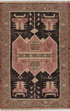 an old rug with pink, brown and black colors on it's border is shown