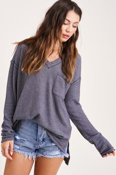 The softest waffle knit long sleeve, you'll never want to take it off. This top can be worn so many different ways, dress up or down. It's lightweight, has a v-neck line, pocket on front, drop sleeves, side slits and falls longer in the back. Made of Polyester/Rayon/Spandex Hand Wash/Hang Dry Loose fit, size down for a more fitted look Waffle Knit Long Sleeve, Waffle Toppings, Living The Dream, Tea Shirt, Color Block Tee, Blue Crewneck, Grey Outfit, Waffle Knit Top, Knit Long Sleeve