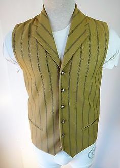 Mustard yellow. This is a fitted vest and there are no adjusters for a clean look. Size marked 20r?. I don't know this size so we will guestimate this at xs or small. I only have this ONE, so get it now, or you may never see it again! Steampunk Sleeveless Vest With Buttons, Steampunk Formal Sleeveless Vest, Formal Sleeveless Steampunk Vest, Formal Steampunk Sleeveless Vest, Gothic Fitted Vest With Buttons, Gothic Sleeveless Vest Outerwear, Fitted Steampunk Vest For Fall, Gothic Fitted Sleeveless Outerwear, Fitted Western Style Vest Outerwear