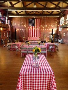 an image of a party with red and white checkered tablecloths on it