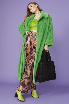 Shop this faux fur vintage-inspired coat a luxe piece that's perfect for transitioning from day to night. We love the oversized shaping, long length and of course the feeling of total comfort and luxury.This coat features full satin lining and pockets.  Maxi oversized faux fur coat, with deep, pattern lined pockets.  15% Acrylic   85% Modacrylic Green Faux Fur Coat Outfit, Green Faux Fur Trim Coat For Fall, Green Fur Jacket, Green Faux Fur Long Sleeve Outerwear, Green Faux Fur Coat, Oversized Faux Fur Coat, Maxi Coat, Ny Fashion, Green Coat