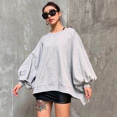 This is perfect for those who are looking for a clothing for a good price. It is fashionable, stylish, and it will look great on anyone who wears it. Do you wanahavit? SIZE S:Bust:171cm,Length:73cm,Raglan sleeves:45cm,Waist:164cm,Shoulder:72cm M:Bust:172cm,Length:74cm,Raglan sleeves:46cm,Waist:168cm,Shoulder:73cm L:Bust:173cm,Length:75cm,Raglan sleeves:47cm ,Waist:172cm,Shoulder:74cm Note: 1 inch = 2.54 cm, 1 cm = 0.39 inch note: measurement by hands allow 2-3cm errors which is normal Trendy Gray Sweatshirt For Layering, Trendy Oversized Plain Sweater, Fall Streetwear Drop Shoulder Tops, Fall Batwing Sleeve Sweatshirt For Layering, Spring Casual Sweater With Lantern Sleeves, Cotton Batwing Sleeve Sweater For Fall, Fall Cotton Sweater With Batwing Sleeves, Casual Lantern Sleeve Sweater For Spring, Casual Lantern Sleeve Spring Sweater