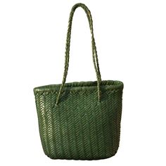 This woven leather handbag is handy. 'Carla' tote that's perfect for everyday use. It features soft yet durable vegetable tan calf leather. Handmade by experienced artisan. Vegetable tanned calf leather - soft and durable.  Use delicate cream to clean and care for the leather. Casual Green Woven Leather Shoulder Bag, Everyday Green Shoulder Bag With Intrecciato Weave, Everyday Intrecciato Basket Shoulder Bag, Green Bucket Bag With Braided Handles, Green Bucket Bag With Braided Handles For Everyday, Eco-friendly Woven Leather Bucket Bag For Everyday, Double Handle Woven Leather Bags For Daily Use, Double Handle Woven Leather Bag, Green Bag With Intrecciato Weave For Everyday Use