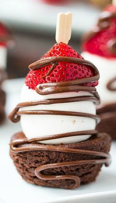 chocolate covered dessert with strawberries on top