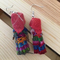 Handmade Mexican Worry Doll Earrings - Fabric Earrings - Aretes de Muñecas Bohemian Jewelry - Gift for Her - Mexican Folk Art Crafts Handmade in Chiapas, Mexico French | Fish Hooks Length (approximate): 2 - 2.5 inches Our earrings are handmade and may have slight imperfections that make them unique & one of a kind. Please check out the photos & feel free to send us a message if you have any questions. Handmade Bohemian Multicolor Wrap Earrings, Unique Handwoven Festival Earrings, Unique Handwoven Earrings For Festivals, Bohemian Adjustable Wrap Earrings Gift, Bohemian Adjustable Wrap Earrings As Gift, Bohemian Adjustable Wrap Earrings For Gift, Whimsical Multicolor Festival Earrings, Handmade Artisan Dangle Wrap Earrings, Handmade Adjustable Wrap Earrings For Festivals