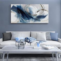 a living room with blue and white decor