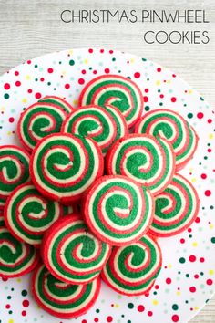 red and green christmas pinwheel cookies on a white plate