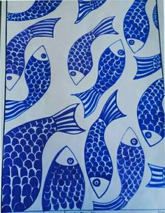 a blue and white painting with fish on it