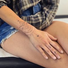 a woman's tattoo on her left leg