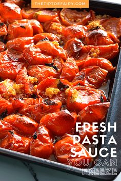 fresh roasted tomatoes in a baking pan with text overlay that reads, fresh pasta sauce you can freeze